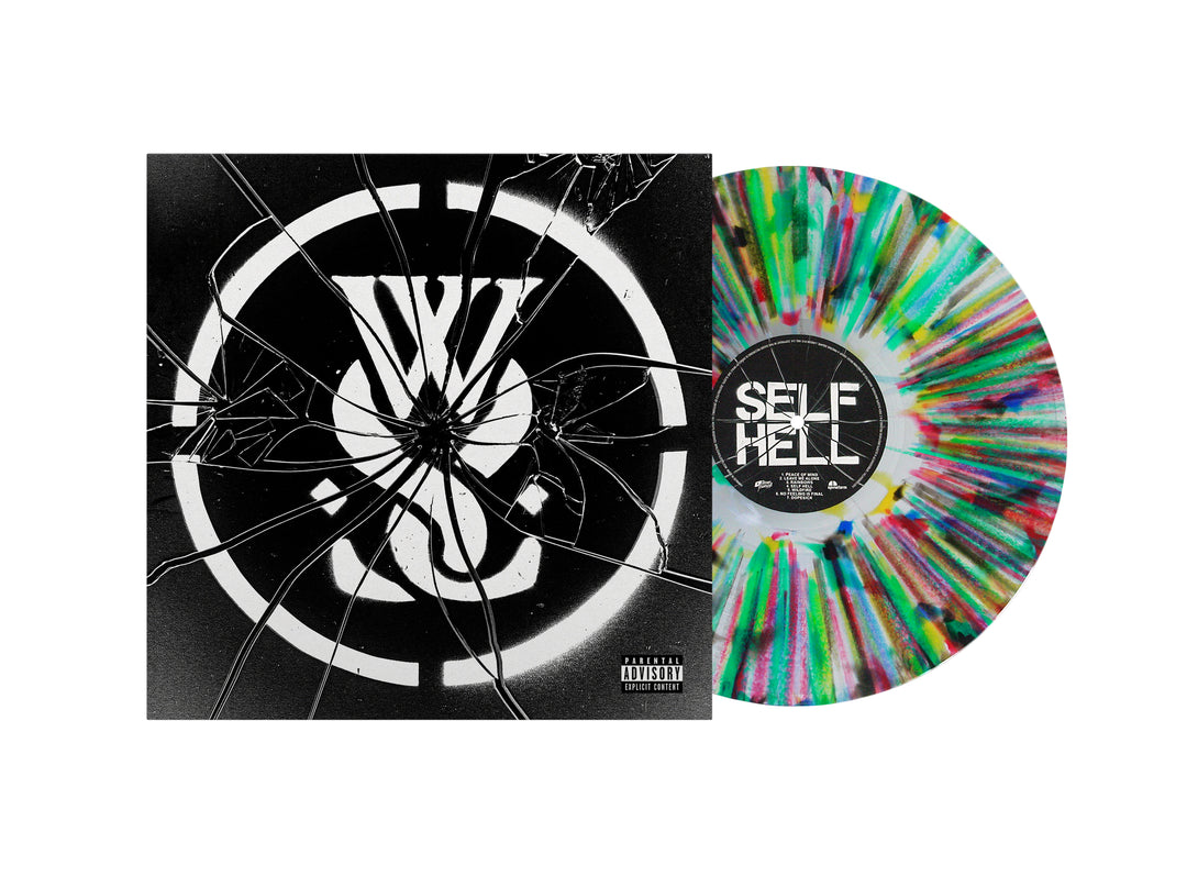 A colorful splatter vinyl sits beside its album cover, which shows a bold white While She Sleeps logo on black with a shattered glass effect. The record label reads “SELF HELL,” from the album released March 29, 2024.