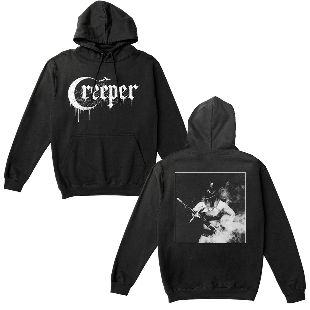 The Creeper black hoodie features Creeper in white gothic font on the front and a black-and-white photo of two figures in dramatic lighting on the back, inspired by gothic fashion.