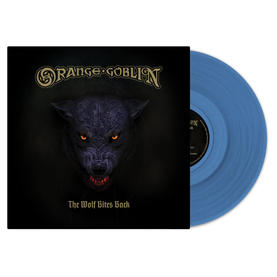 A blue vinyl record slides out from an album cover featuring a fierce black wolf with glowing orange eyes and sharp teeth. The cover displays the brand name Orange Goblin and the album title The Wolf Bites Back.