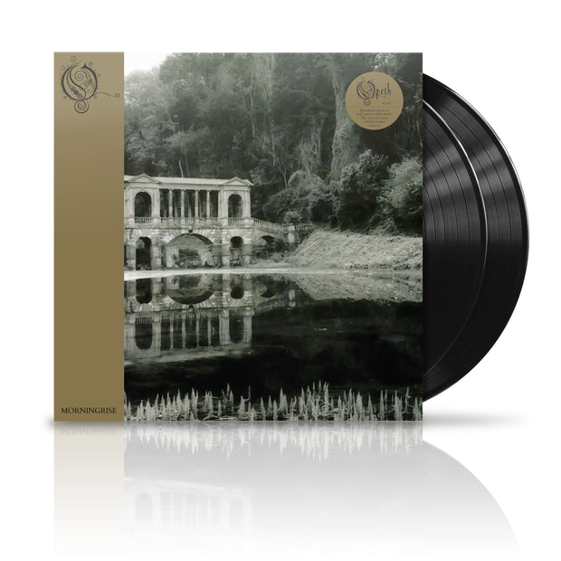 Opeth "Morning Rise" Vinyl LP. vinyl exposed to show color of vinyl, color is Black. Album art shows creepy stone bridge in the woods near a small pond. 