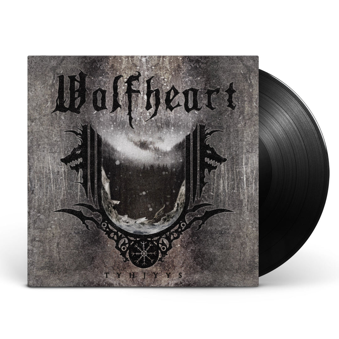 A vinyl record slides from its sleeve displaying Wolfheart’s album Tyhjyys. The cover showcases a wintry, dark landscape with gothic lettering and an ornate emblem, capturing the Call Of The Winter theme.