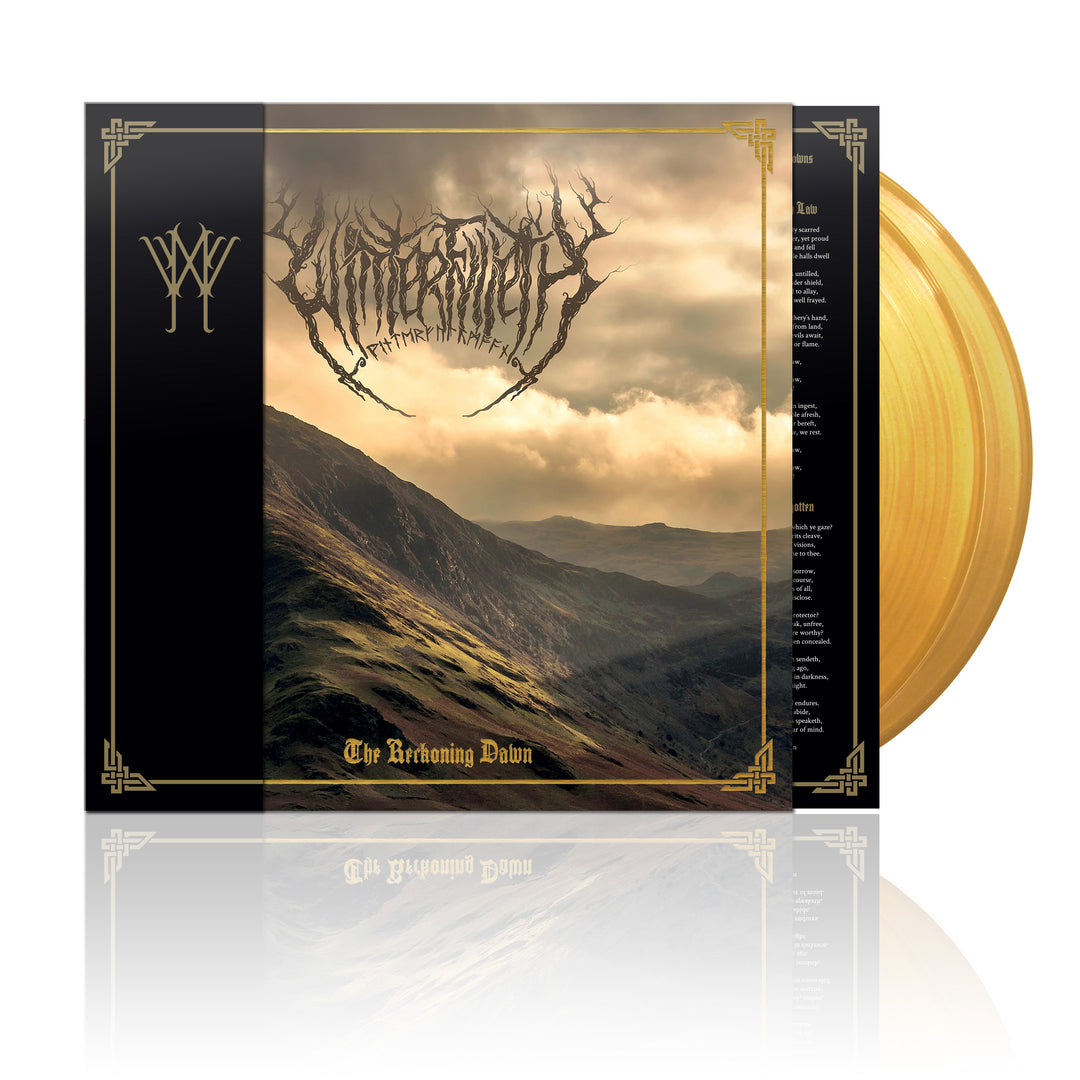 A gold-colored vinyl record with a black album cover featuring a mountainous landscape and the band's logo.