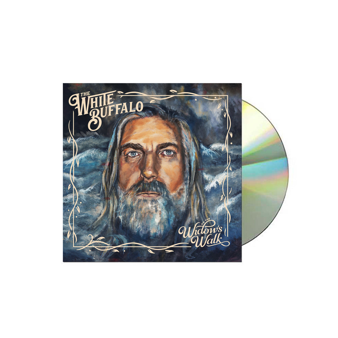 A CD of On the Widows Walk by The White Buffalo features cover art with a painted bearded man against a dark, cloudy background. Produced by Shooter Jennings, the ornate script album title appears on the cover. Brand: The White Buffalo.