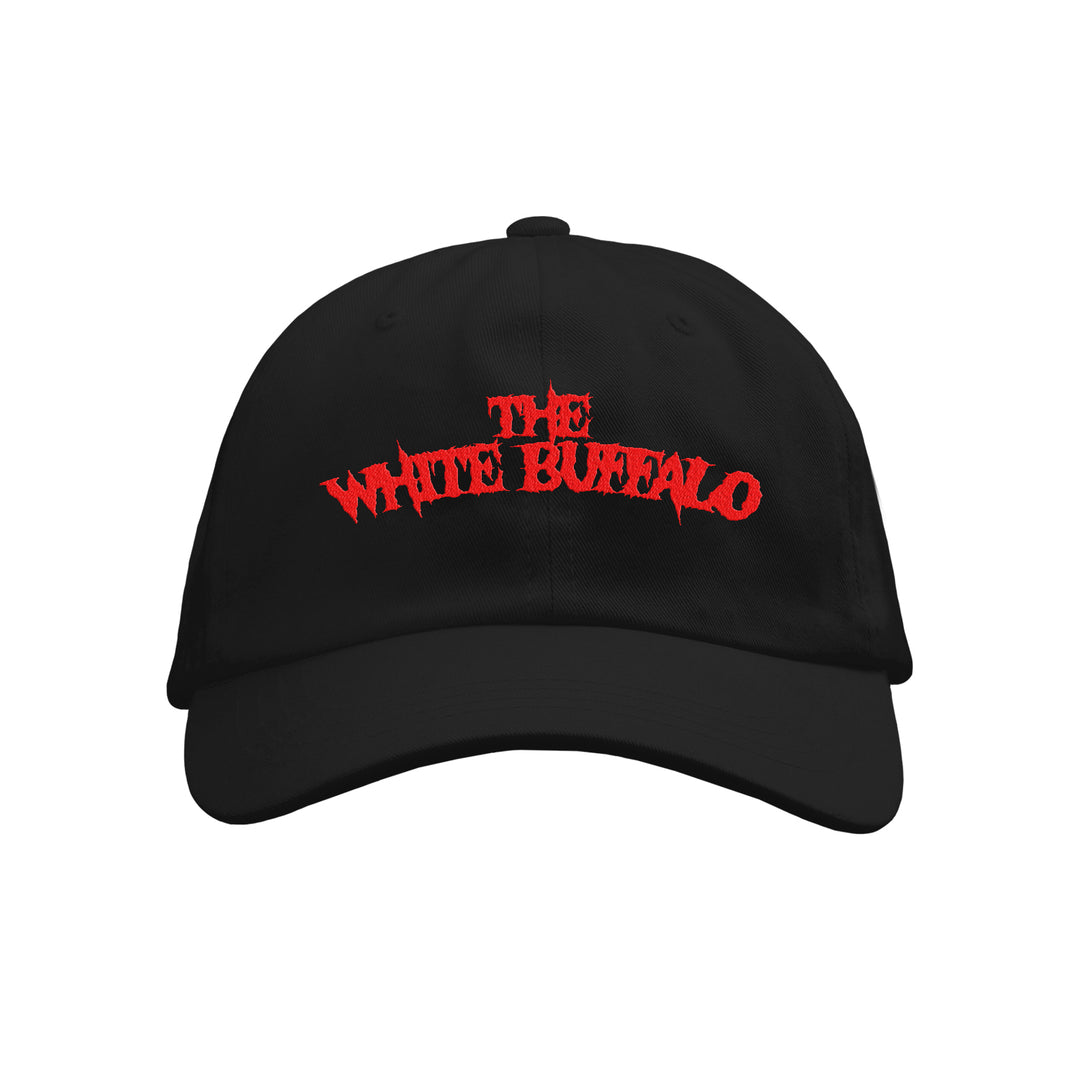 A black bio-washed cotton dad hat from The White Buffalo, featuring bold red embroidery of THE WHITE BUFFALO on the front.