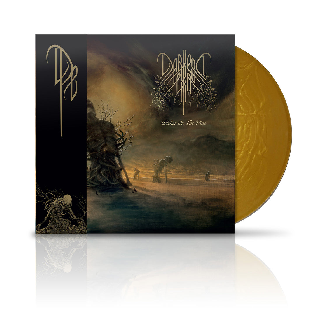 A limited edition vinyl with a golden disc peeking through its cover. The art shows eerie figures in a misty, dark landscape with twisted trees and a gloomy sky. Brand: Darkest Era; Album: Wither On The Vine.