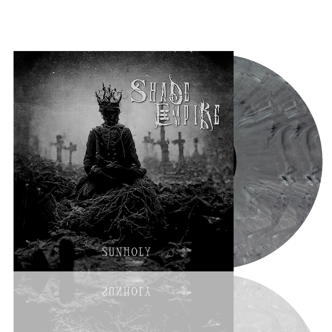 Shade Empires Sunholy album cover depicts a crowned, robed figure amid twisted roots and foggy crosses, evoking a dark Rite of Passage. Includes gray marbled vinyl partially visible.