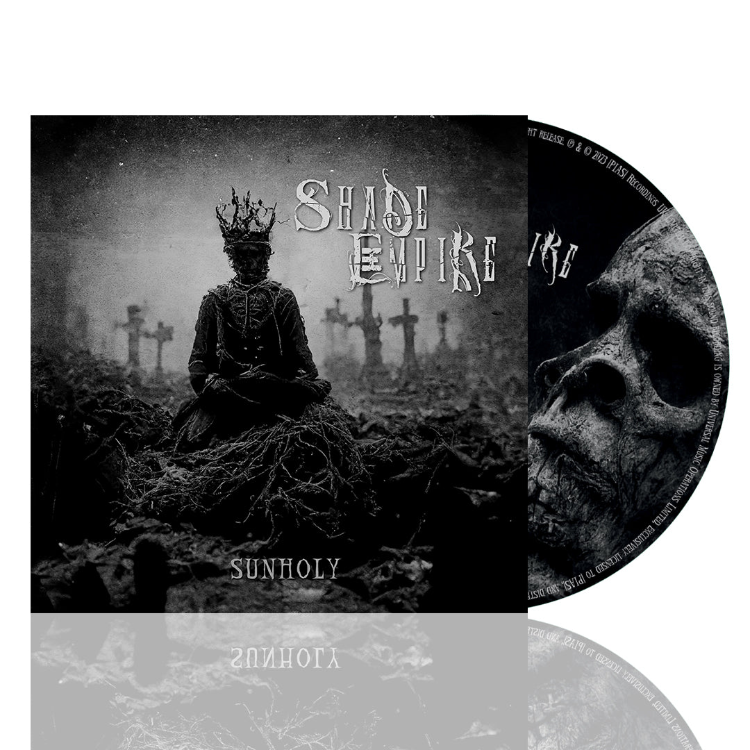 The Shade Empire Sunholy album cover features a crowned, eerie figure in a graveyard with crosses, reflecting the dark music inside. The CD shows a close-up of a worn, skeletal face.