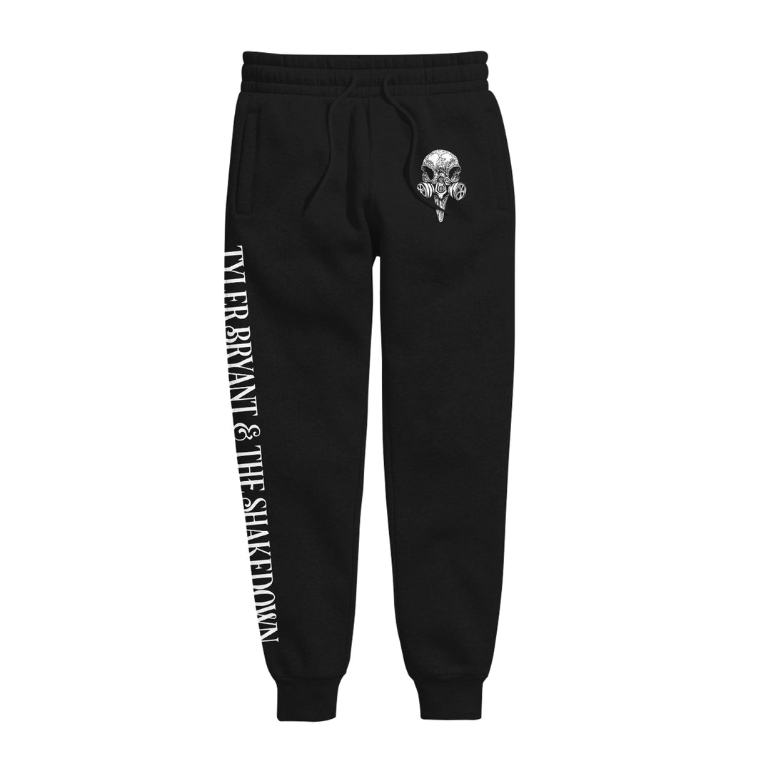 Black sweatpants featuring a white skull graphic on the left pocket and Tyler Bryant & the Shakedown printed vertically in white on the left leg.