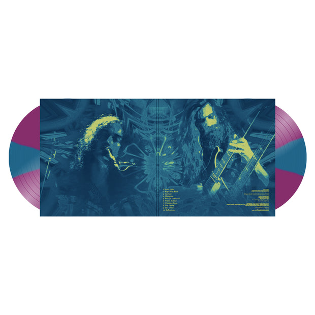 inside image for the Odyssey Vol 1. Sea Blue & Orchid Pinwheel Vinyl.
