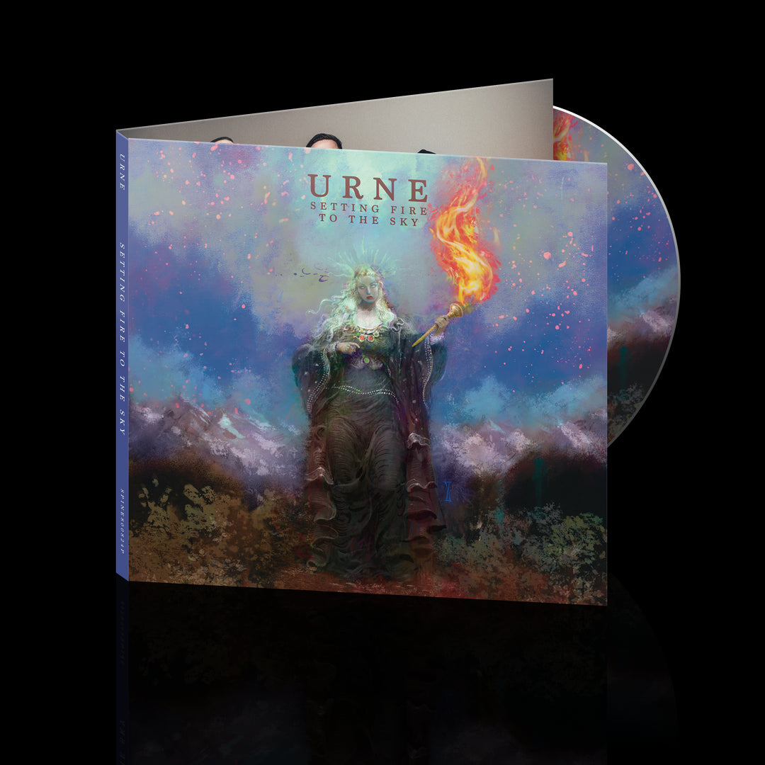 Album cover and CD for Setting Fire to the Sky by Urne. The artwork features a mystical figure holding a burning torch in a vivid, fantasy landscape under a colorful sky, evoking nocturnal forms. Brand Name: Urne.