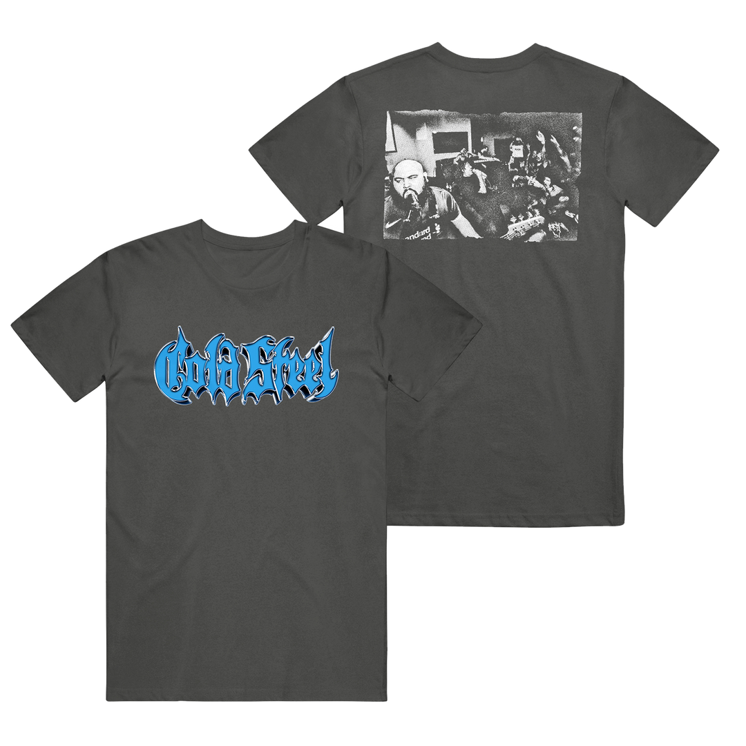 A black Cold Steel Comfort Colors tee with a blue gothic-style logo on the front and a black-and-white hardcore show photo with crowd on the back.