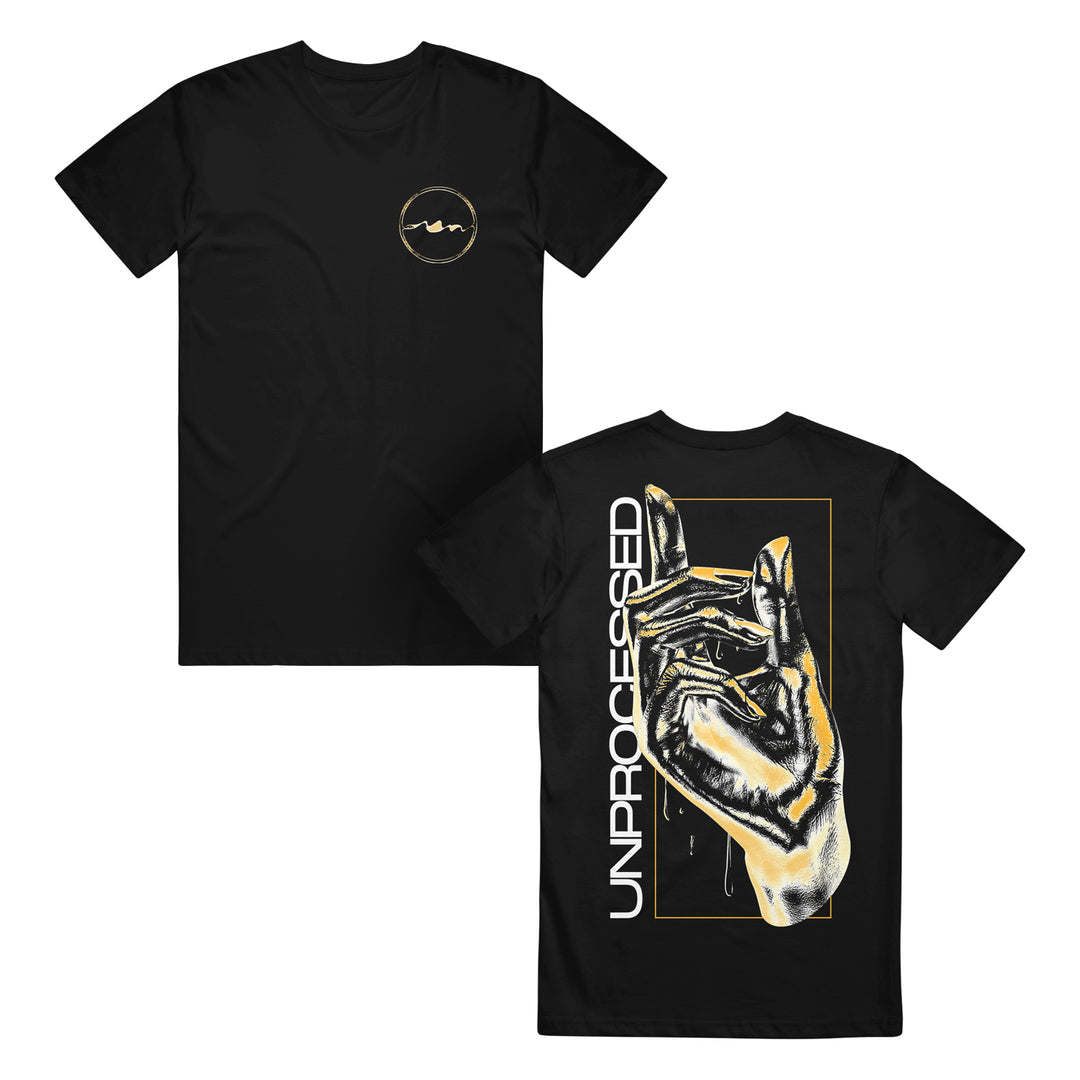 Unprocessed black Gildan Heavy Cotton t-shirt featuring a small circular logo on the left chest, a large yellow-outlined artistic hand design on the back, and “UNPROCESSED” vertically on the left. Classic fit, 100% cotton.