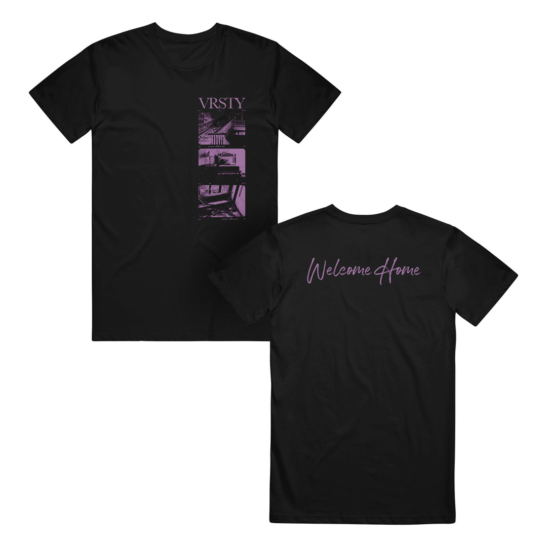 VRSTY black t-shirt with purple graphics; VRSTY text and three vertical rectangles on the front, and handwritten-style Welcome Home in purple on the back.