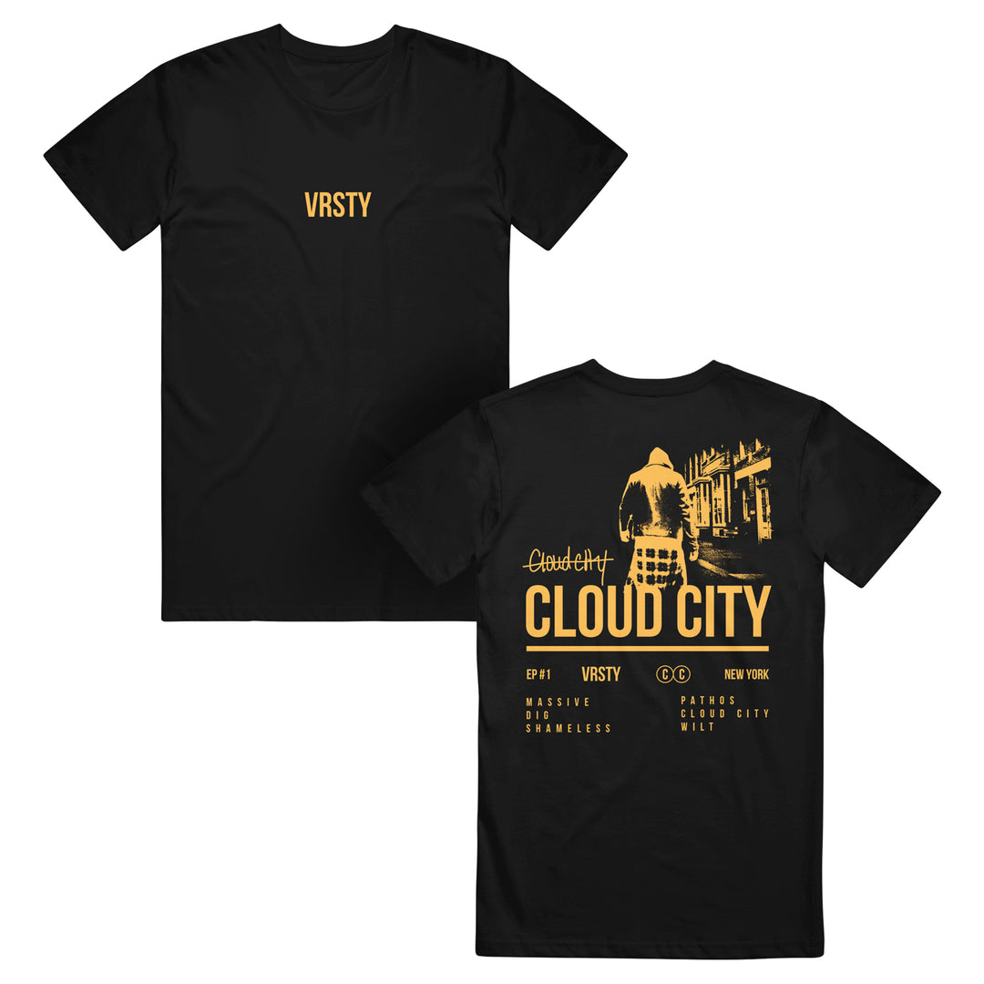 Black VRSTY T-shirt with gold VRSTY on the front. Back shows a gold hooded figure in a city with Cloud City, band and tour info, and New York, all in gold.