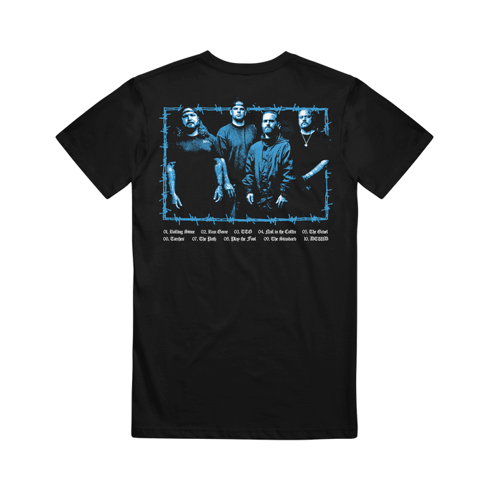 The Southpaw FLHC Photo Black T-shirt features a blue-tinted image of four men standing together on the back, framed in barbed wire, with white song titles listed below.