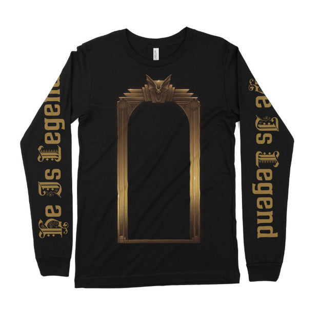 image of a black long sleeve tee shirt on a white background. tee has full print in gold of a doorway. each sleeve has a gold print that says he is legend
