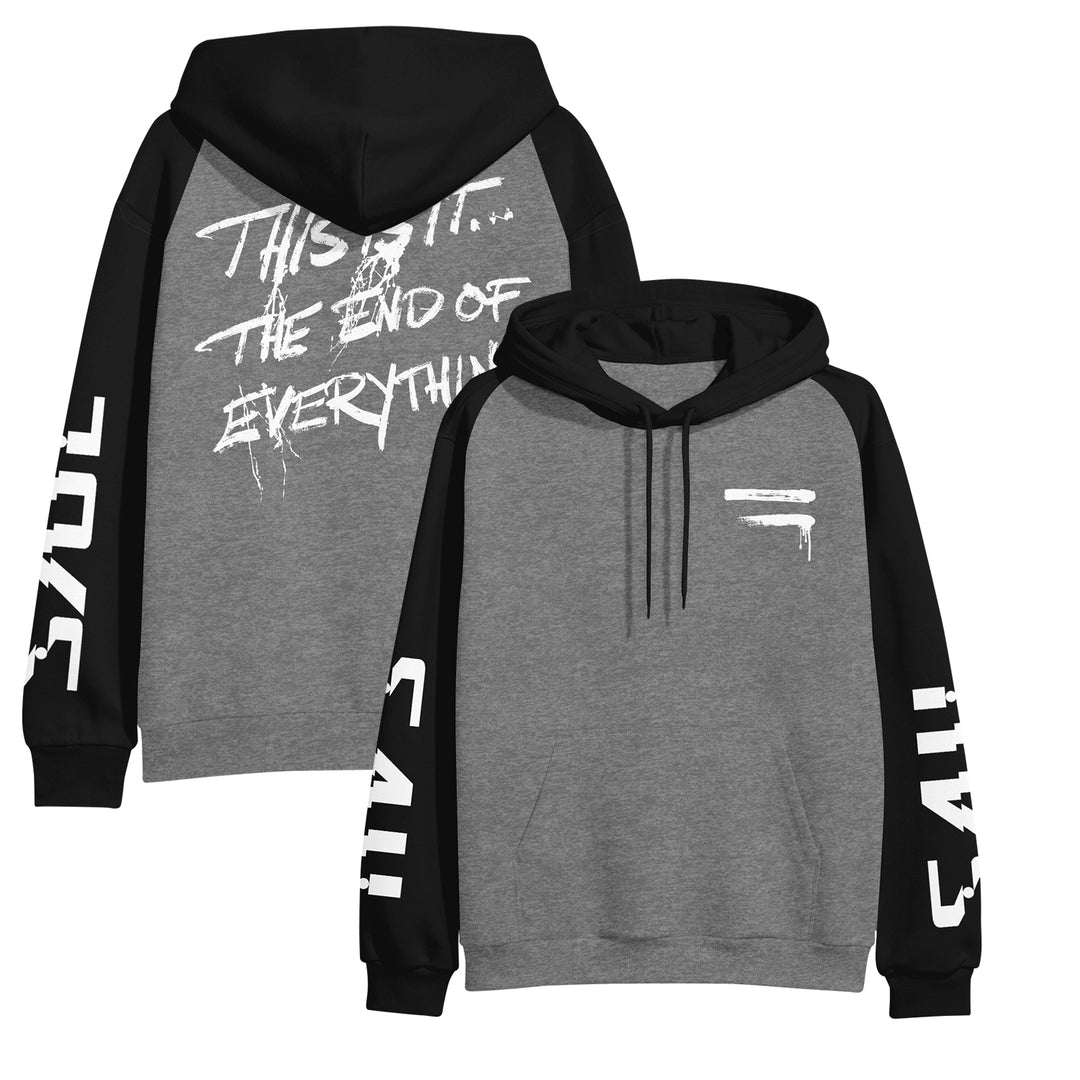 A gray and black unisex Raglan Pullover Hoodie by Saul, crafted from soft ring-spun cotton fleece. Features graffiti-style THIS IS IT... THE END OF EVERYTHING text on the back, bold sleeve lettering, and a small front graphic.