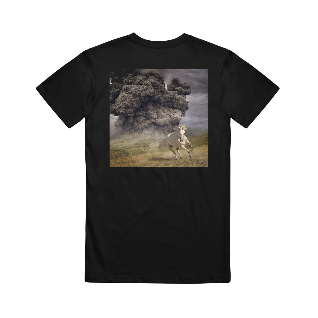 The White Buffalo classic fit black T-shirt, made from 100% cotton, features a running horse on grass beneath a smoky cloud background.