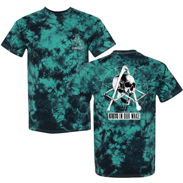 image of a black and teal mineral wash tie dye tee shirt on a white background. front is on the left and has a small right chest print in black and white of the letter A. back is on the right and has a center back print of a skull head. below says atreyu in our wake