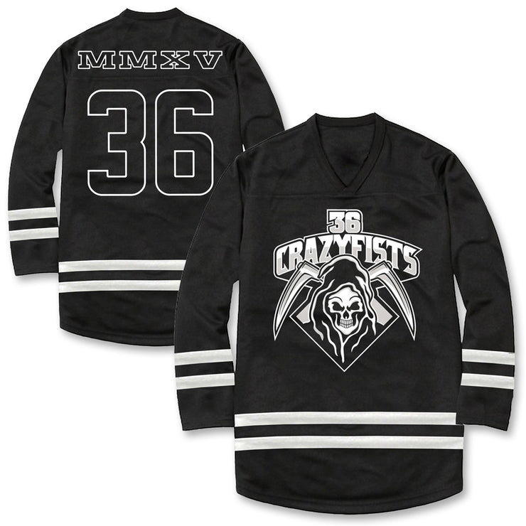 image of the front and back of a black hockey jersey on a white background. back of jersey is on the left and says m m x v at the top and the number 36 below. the front of the jersey is on the right and has a grim reaper face and says 36 crazyfists at the top
