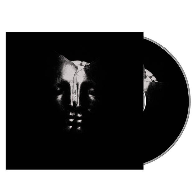 image for the IMPORT Self Titled Deluxe Edition CD. cover is black and white skull