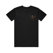 image of the front of a black tee shirt on a white background. tee has a small gold print on the right chest of a dead bat