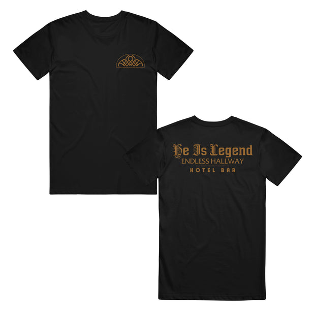 image of the front and back of a black tee shirt on a white background. front is on the left and has a small gold right chest print of a geometric design. back is on the right and has a gold print across the shoulders that says he is legend endless hallway hotel bar