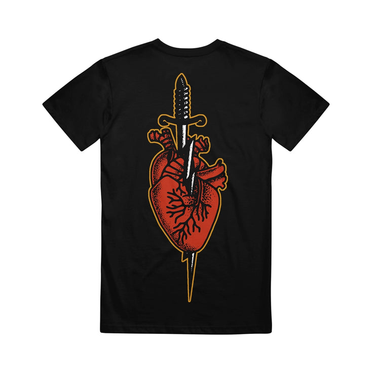 image of the back of a black tee shirt on a white background. tee has full print of a heart with a dagger through it