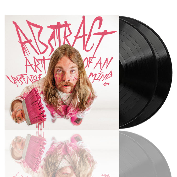 image for the Abstract Art Of An Unstable Mind Black Double vinyl. vinyl on the right cover on the left with the title and austin meade holding a paint brush with pink paint